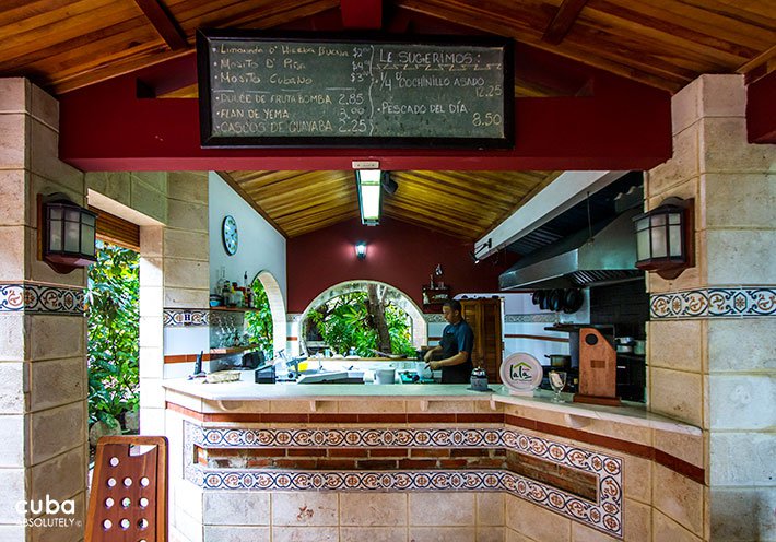 Lala restaurant in Vedado, open kitchen with the menu up in a board © Cuba Absolutely, 2014