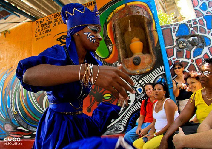 Woman in blue making the dance of Yemaya, african goddess of water at Hanel Alley in Center Havana  © Cuba Absolutely, 2014