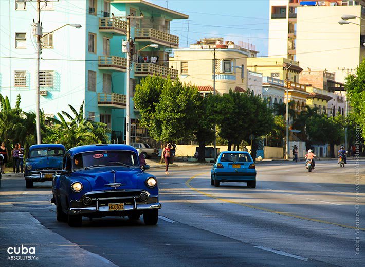 Blue old car on 23 street © Cuba Absolutely, 2014