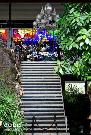 Big stair with a stained-glass window at the end © Cuba Absolutely, 2014