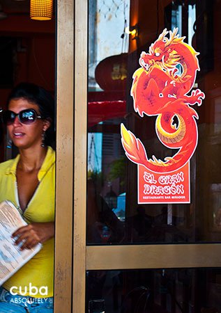 Girl getting out El Gran Dragon, chinese restaurant in Old Havana © Cuba Absolutely, 2014