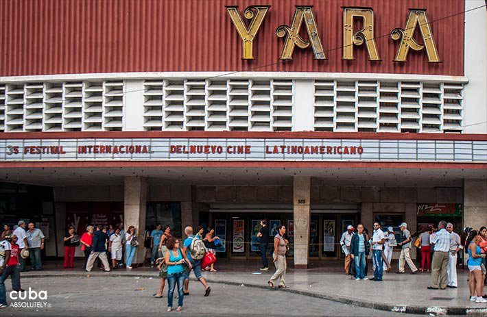 Yara cinema in Vedado painted in red with a big sign © Cuba Absolutely, 2014 - 2020