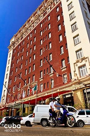 Presidente hotel in Vedado, front red and white building © Cuba Absolutely, 2014 - 2020