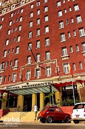 Presidente hotel in Vedado, front red and white building © Cuba Absolutely, 2014 - 2020