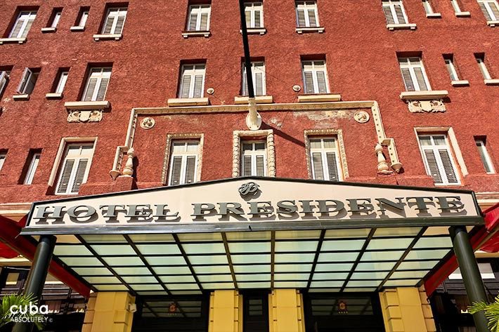 Presidente hotel in Vedado, front red and white building © Cuba Absolutely, 2014 - 2020