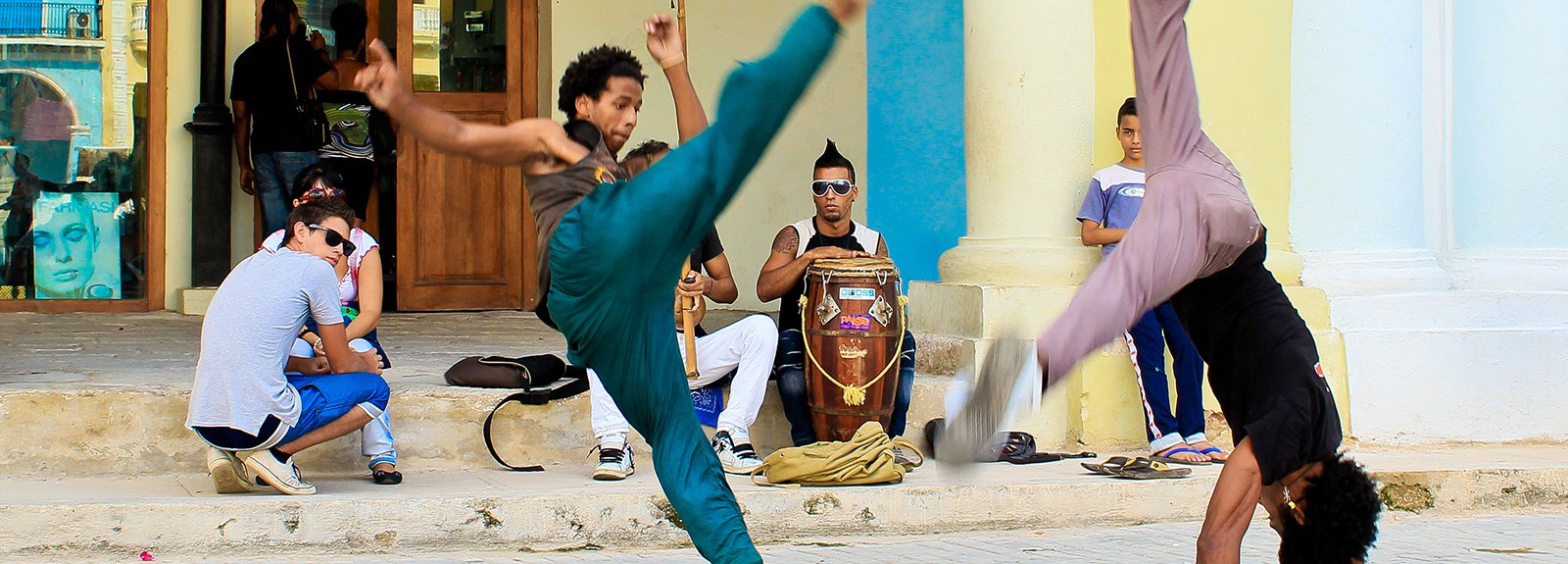 Two boys practicing Capoeira