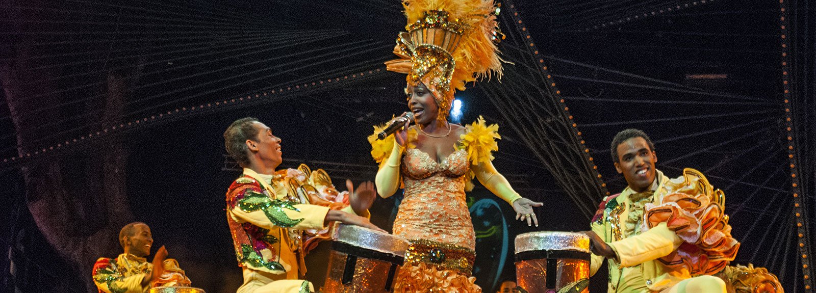 Dancers with costumes performing at Tropicana