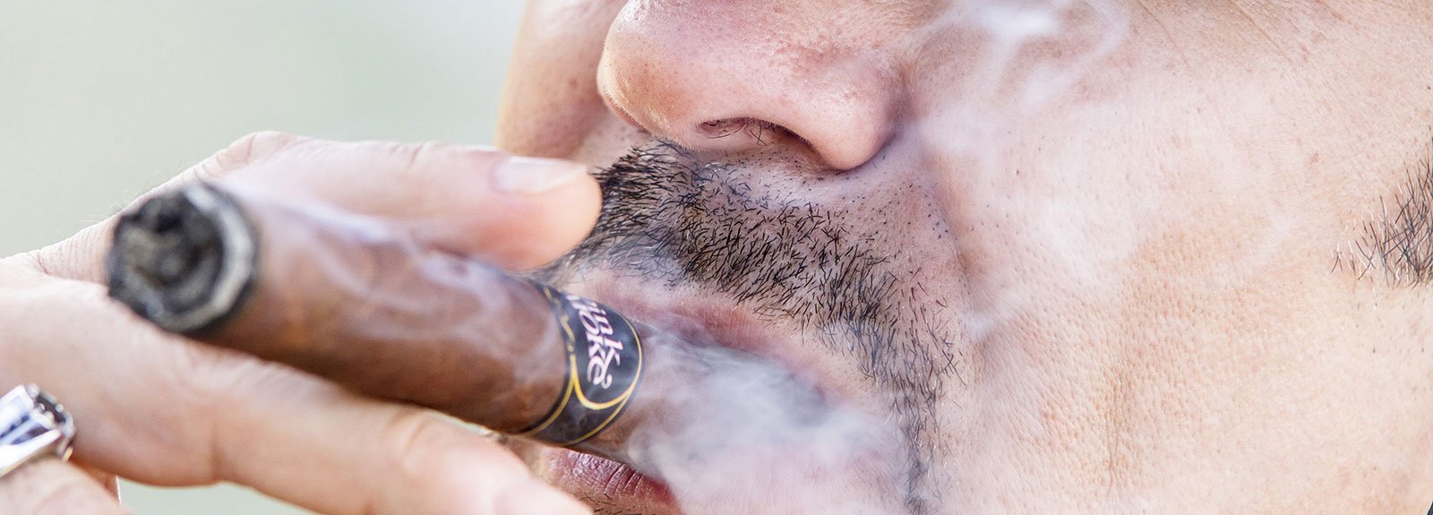 Man smoking a tobacco