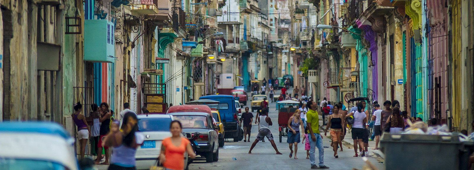 Street in Old Havana with kids playing and people walking